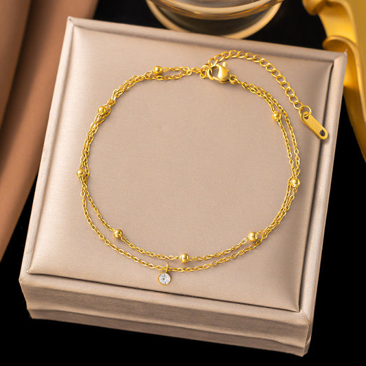 Elegant Double-Layer Gold Bracelet with Charm